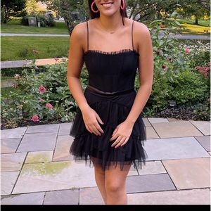 Black corset top mini dress with tulle tiers. Wore this as a hoco dress!